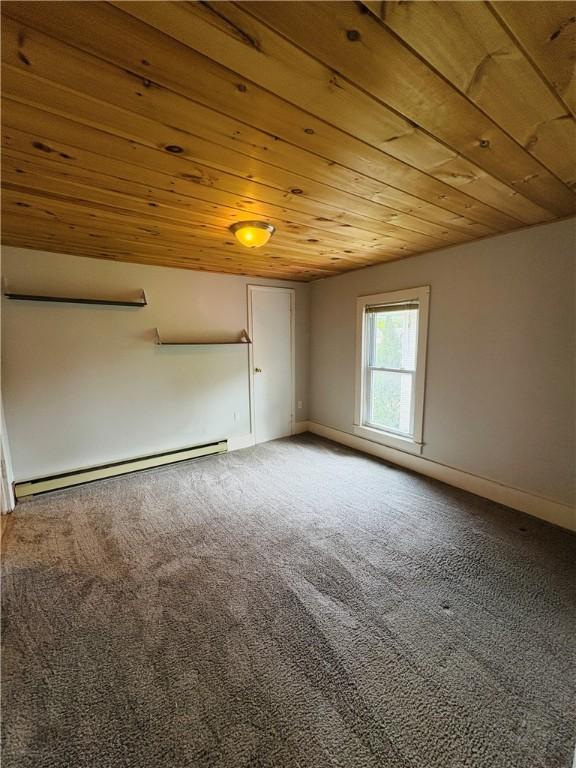 216 W William St Unit 201, Corning-City, NY 14830 - unfurnished room with wooden ceiling, a baseboard heating unit, and light carpet
