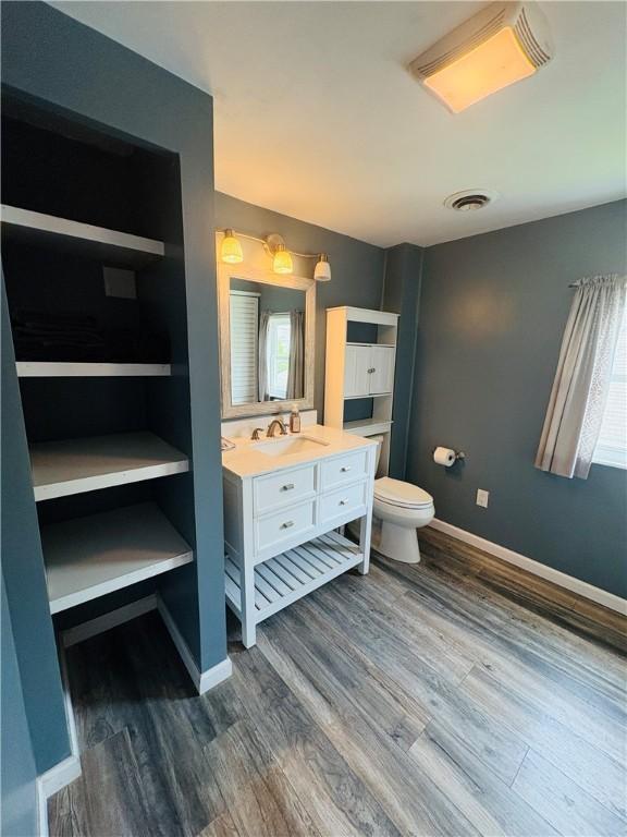 216 W William St Unit 201, Corning-City, NY 14830 - bathroom featuring vanity and wood finished floors