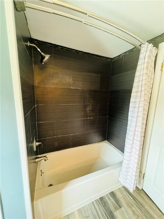 216 W William St Unit 201, Corning-City, NY 14830 - full bath featuring shower / tub combo with curtain