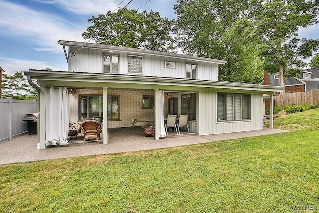 425 Vanderbilt Ave, Niagara Falls, NY 14305 - rear view of house with a patio area and brick siding