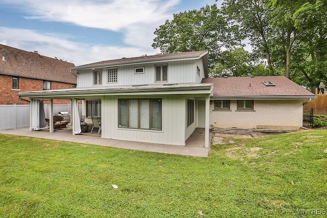 425 Vanderbilt Ave, Niagara Falls, NY 14305 - rear view of property featuring a patio and roof with shingles