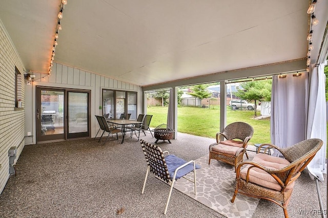 425 Vanderbilt Ave, Niagara Falls, NY 14305 - sunroom / solarium featuring lofted ceiling and a fire pit