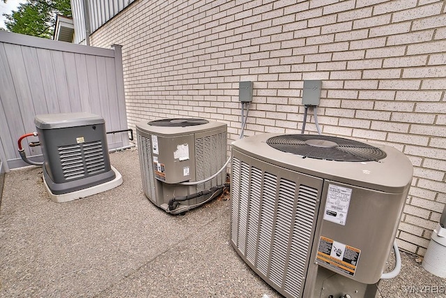 425 Vanderbilt Ave, Niagara Falls, NY 14305 - exterior view of a cooling unit and brick siding