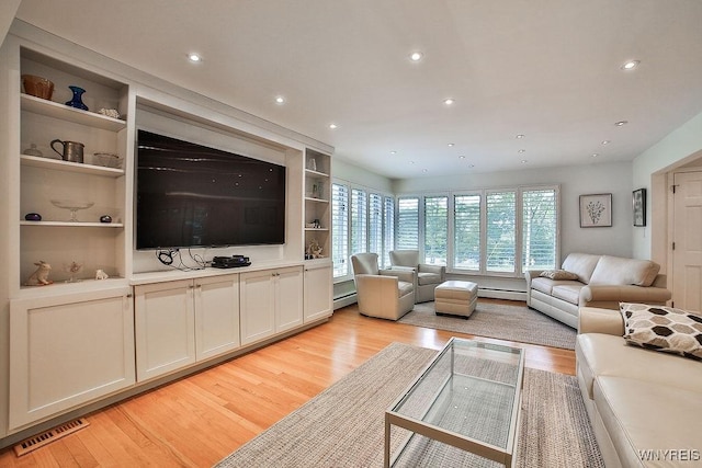 425 Vanderbilt Ave, Niagara Falls, NY 14305 - living area featuring light wood-style flooring, recessed lighting, baseboard heating, and built in features