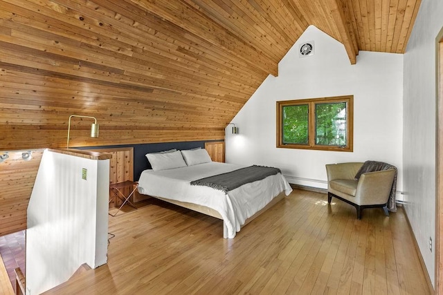 8 Small Rd, Middletown, NY 12455 - bedroom featuring wood ceiling, lofted ceiling, a baseboard heating unit, hardwood / wood-style flooring, and wooden walls