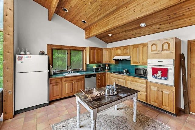 8 Small Rd, Middletown, NY 12455 - kitchen featuring white appliances, under cabinet range hood, tasteful backsplash, tile countertops, and light tile patterned flooring