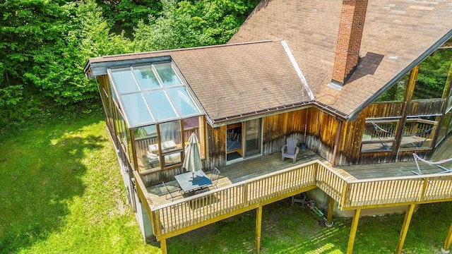 8 Small Rd, Middletown, NY 12455 - back of property with a chimney, a deck, and a lawn