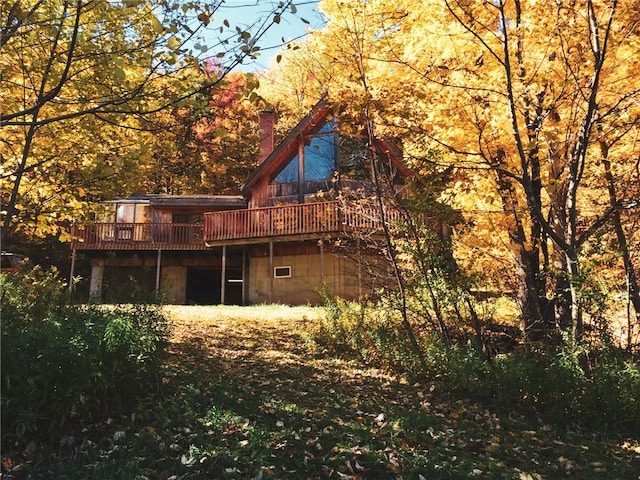 8 Small Rd, Middletown, NY 12455 - back of house featuring a chimney and a deck