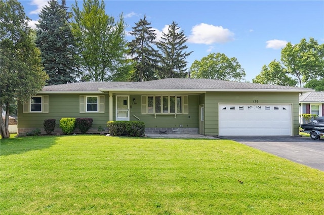 130 Quay Dr, Irondequoit, NY 14617 - single story home with driveway, a garage, and a front yard