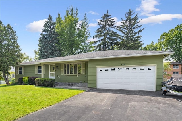 130 Quay Dr, Irondequoit, NY 14617 - ranch-style home featuring an attached garage, asphalt driveway, and a front yard