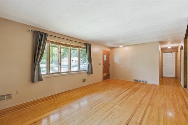 130 Quay Dr, Irondequoit, NY 14617 - unfurnished room with light wood-type flooring and baseboards