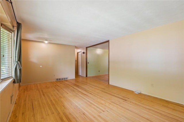 130 Quay Dr, Irondequoit, NY 14617 - unfurnished room featuring light wood-style floors and healthy amount of natural light