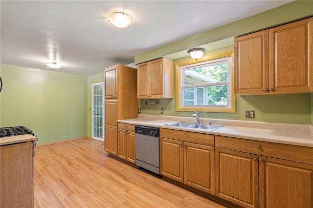 130 Quay Dr, Irondequoit, NY 14617 - kitchen with dishwasher, light countertops, light wood-type flooring, and brown cabinets