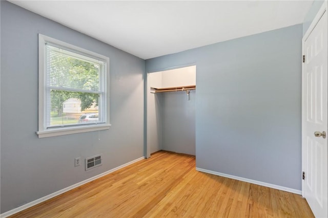130 Quay Dr, Irondequoit, NY 14617 - unfurnished bedroom featuring light wood-type flooring and a closet