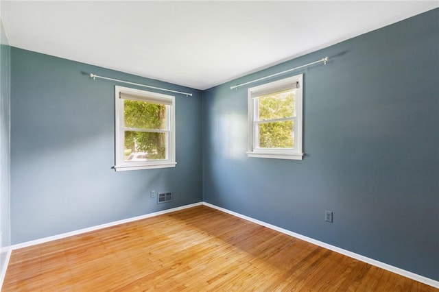 130 Quay Dr, Irondequoit, NY 14617 - spare room with healthy amount of natural light and light wood-style floors