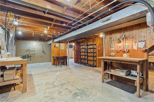130 Quay Dr, Irondequoit, NY 14617 - unfinished below grade area with a workshop area and wooden walls