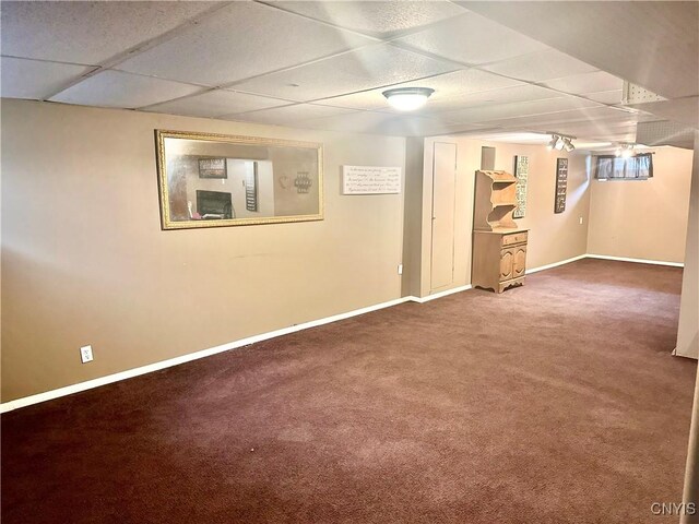 407 Pleasant St, Utica, NY 13501 - finished basement with a paneled ceiling and carpet
