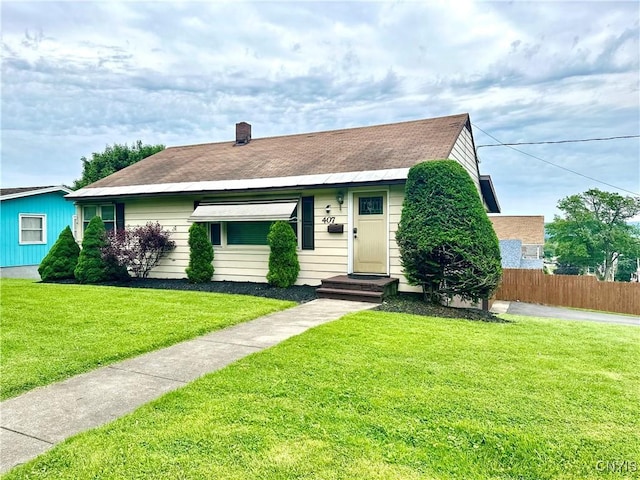 407 Pleasant St, Utica, NY 13501 - view of front of house with a chimney