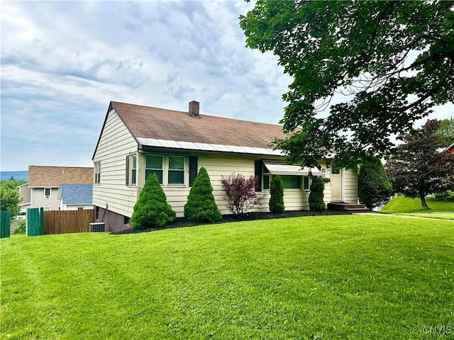 407 Pleasant St, Utica, NY 13501 - view of front of property featuring a chimney and a shingled roof