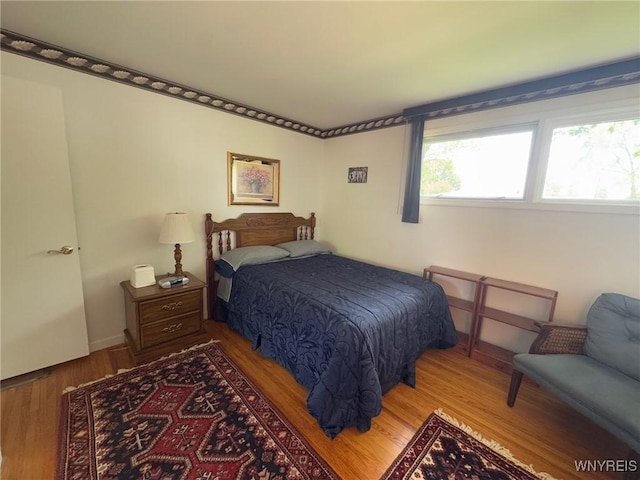 66 Fairlane Ave, Tonawanda-Town, NY 14150 - bedroom featuring wood finished floors and baseboards