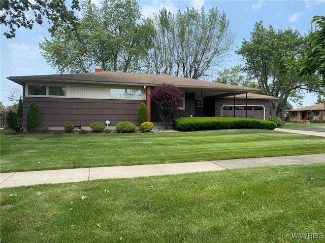 66 Fairlane Ave, Tonawanda-Town, NY 14150 - ranch-style home with a garage, a front lawn, and driveway
