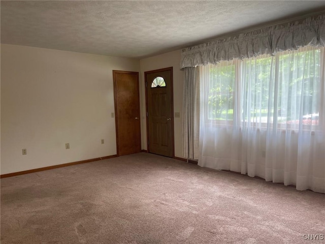 201 Sayles St, Oneida-Inside, NY 13421 - unfurnished room with light colored carpet and a textured ceiling