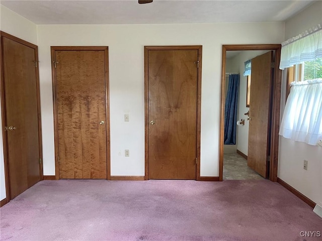 201 Sayles St, Oneida-Inside, NY 13421 - unfurnished bedroom with carpet flooring and two closets