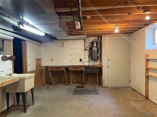 201 Sayles St, Oneida-Inside, NY 13421 - below grade area with a workshop area and a central vacuum unit
