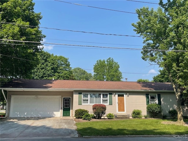 201 Sayles St, Oneida-Inside, NY 13421 - single story home featuring a garage, driveway, and a front lawn