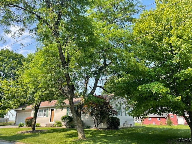 201 Sayles St, Oneida-Inside, NY 13421 - view of front of house featuring a front yard and a garage