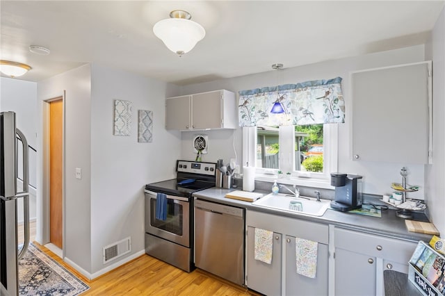 3 Harbour Ln, South Bristol, NY 14424 - kitchen with stainless steel appliances and light wood finished floors