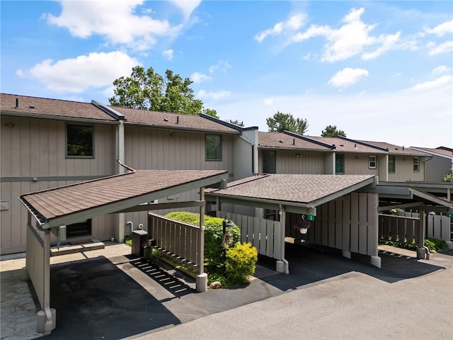 3 Harbour Ln, South Bristol, NY 14424 - view of building exterior featuring covered parking and a residential view