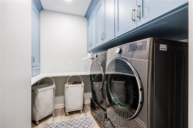 15 Cathedral Oaks, Perinton, NY 14450 - laundry room with cabinet space, light wood-style flooring, and washer and dryer