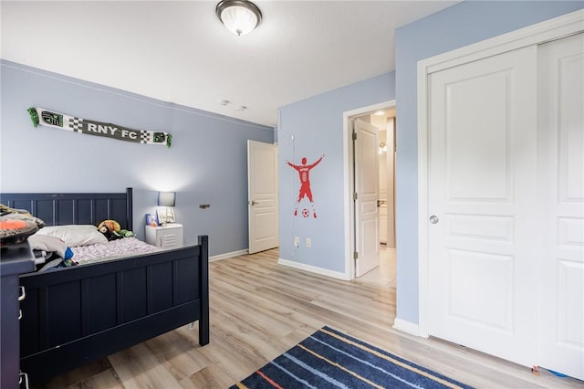 15 Cathedral Oaks, Perinton, NY 14450 - bedroom featuring light wood-type flooring and baseboards