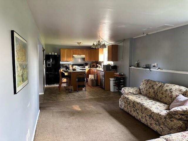 41 Wallman Dr, Henrietta, NY 14467 - living room featuring light carpet and baseboards