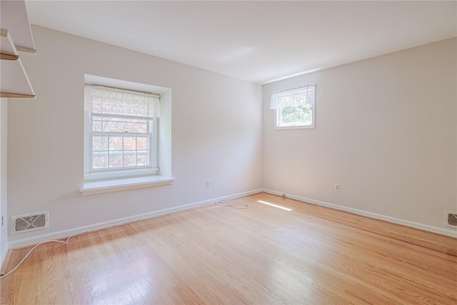21 Chipping, Perinton, NY 14450 - empty room featuring wood finished floors and baseboards
