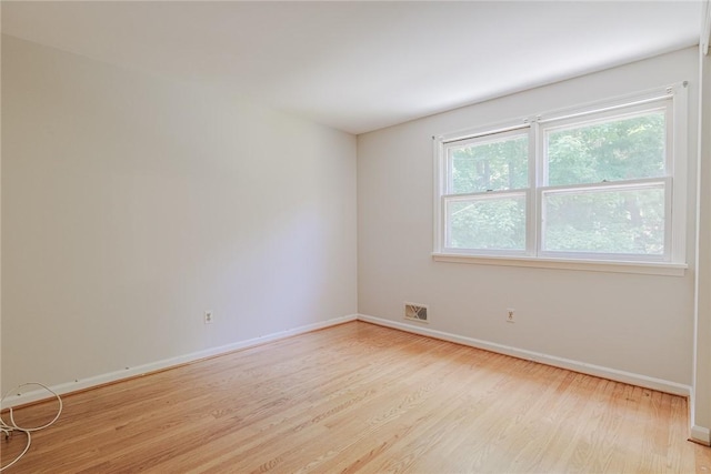 21 Chipping, Perinton, NY 14450 - empty room featuring light wood-style flooring and baseboards