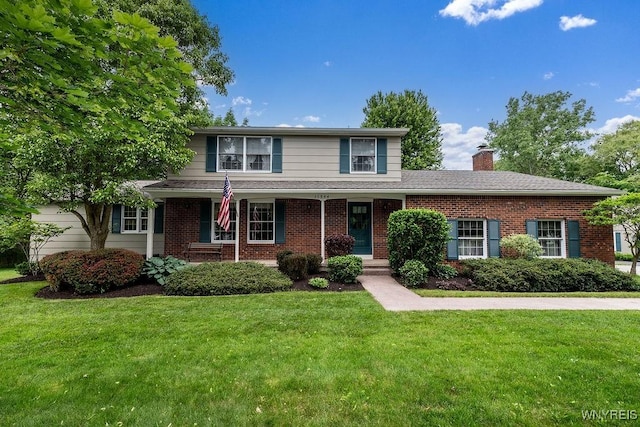 11544 Howe Rd, Newstead, NY 14001 - traditional-style house with a chimney, brick siding, a front lawn, and a porch