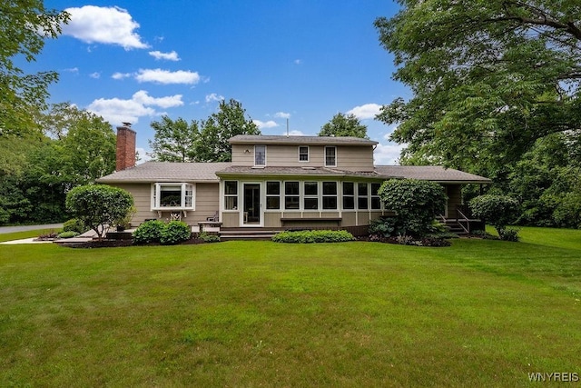11544 Howe Rd, Newstead, NY 14001 - back of property with a chimney, a yard, a sunroom, and roof with shingles