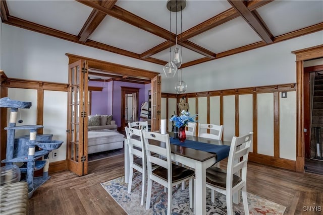 302 N James St, Wilna, NY 13619 - dining room with french doors, coffered ceiling, beam ceiling, and wood finished floors