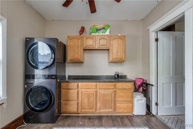 302 N James St, Wilna, NY 13619 - laundry room featuring stacked washer and clothes dryer, a ceiling fan, cabinet space, and dark wood-style floors