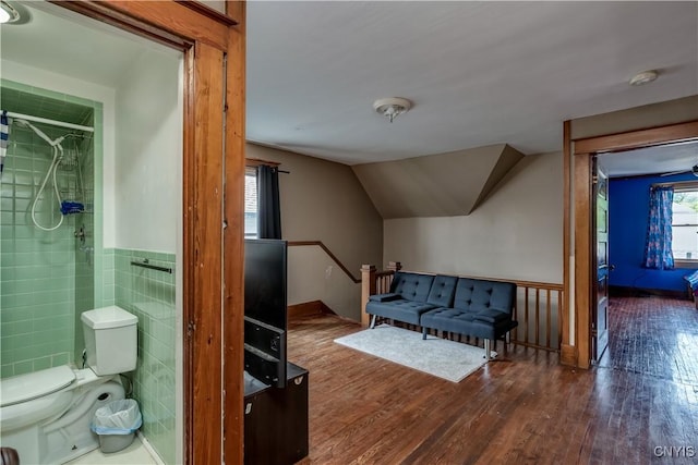302 N James St, Wilna, NY 13619 - full bath with wood finished floors, tiled shower, and vaulted ceiling