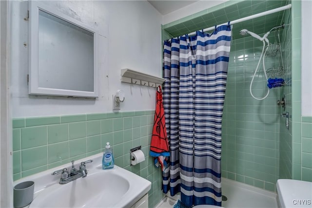 302 N James St, Wilna, NY 13619 - full bathroom featuring tile walls and a shower stall