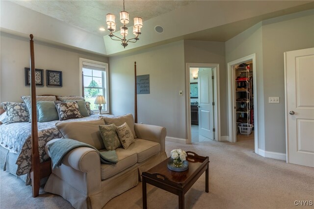 3389 Long Shadow Dr, Lysander, NY 13027 - bedroom with light colored carpet, a spacious closet, a chandelier, a closet, and connected bathroom