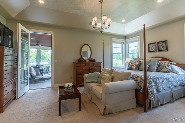 3389 Long Shadow Dr, Lysander, NY 13027 - bedroom with a tray ceiling, light carpet, access to exterior, a chandelier, and recessed lighting