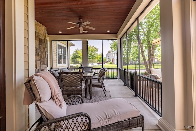 3389 Long Shadow Dr, Lysander, NY 13027 - sunroom featuring ceiling fan and outdoor dining area