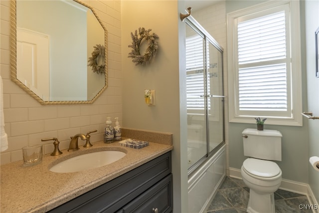 3389 Long Shadow Dr, Lysander, NY 13027 - bathroom with vanity, bath / shower combo with glass door, tasteful backsplash, and tile patterned floors