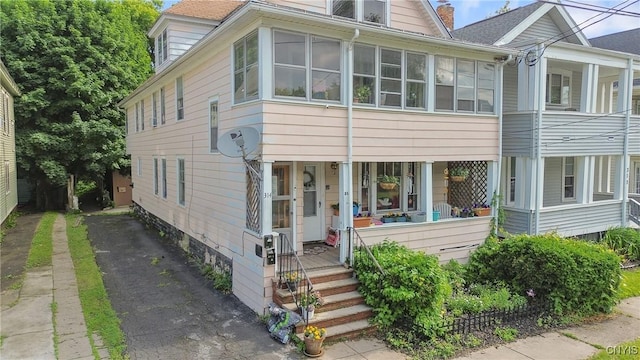314 Apple St, Syracuse, NY 13204 - view of front of house with a porch and a chimney
