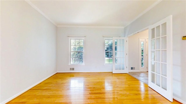 106 Woodsview, Erwin, NY 14870 - spare room featuring light wood-type flooring, french doors, and ornamental molding