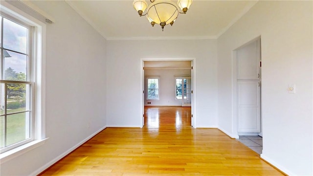 106 Woodsview, Erwin, NY 14870 - corridor with a chandelier, light wood-type flooring, and crown molding